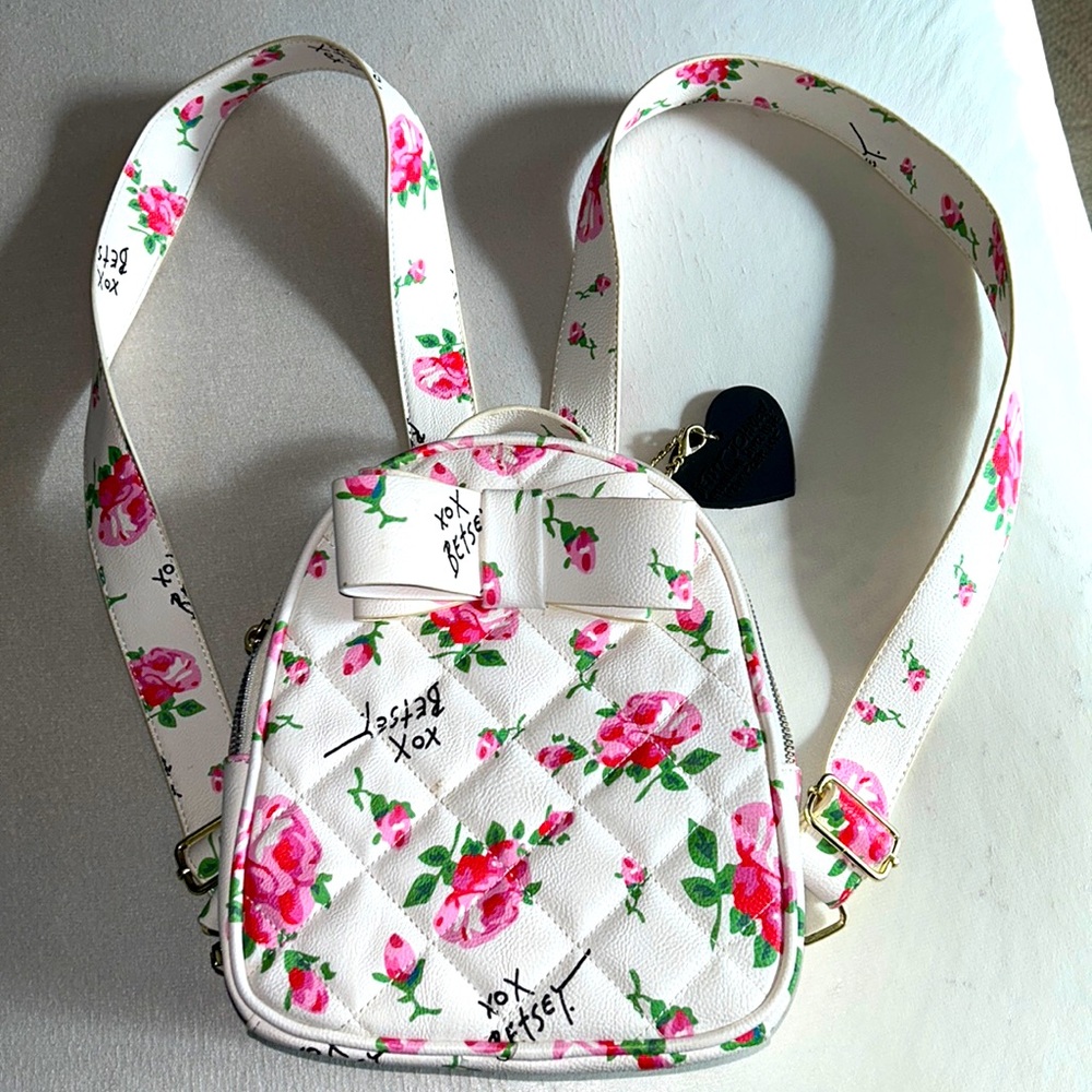 ** Betsey Johnson small logo backpack ** this bag is in excellent condition.